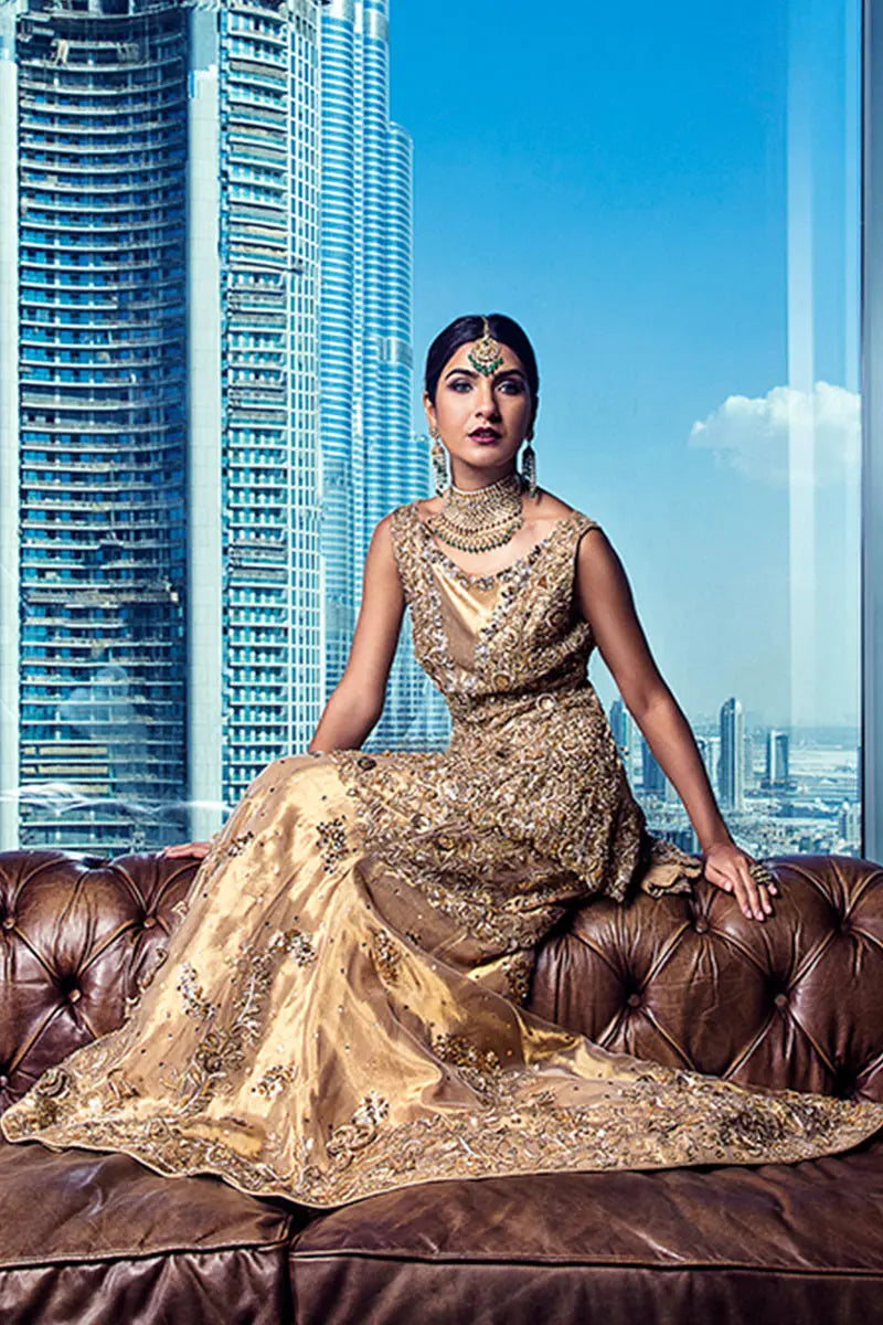 Zeina - Luxurious Dull Gold Tissue Lehenga & Peplum by Reema Ahsan